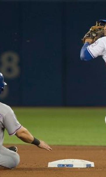 Smoak's 2 HRs lead Blue Jays over Rangers 3-1 in 10 innings